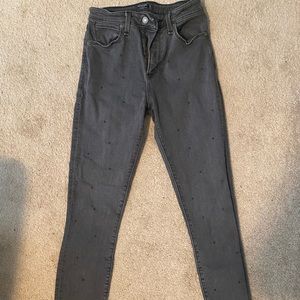 High rise jeans with polka dot detail